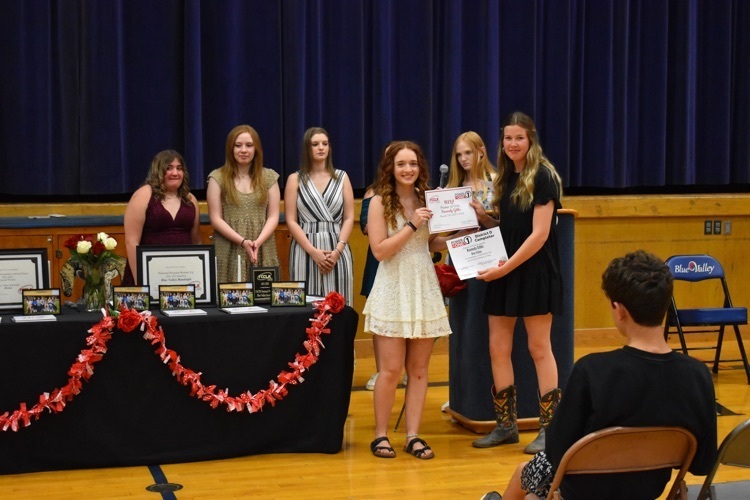 Kennedy receiving one of her awards 